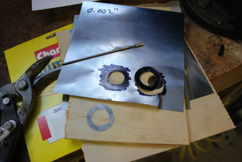 Cutting crankshaft shims with shim stock